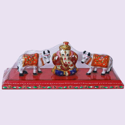 Metal Handcrafted Lord Ganesha with Standing Cow Pair on Wooden Chowki Showpiece for Home Decor (D28)