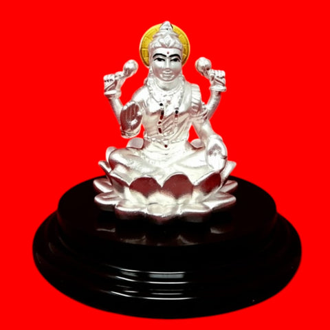 999 Pure Silver Small Circular Lakshmi Idol with Yellow Headrest in Circular Base