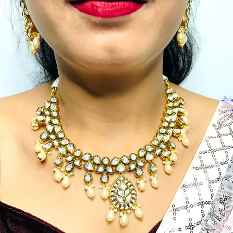 Designer Gold Plated Royal Kundan Necklace with Earrings & Mangtikka