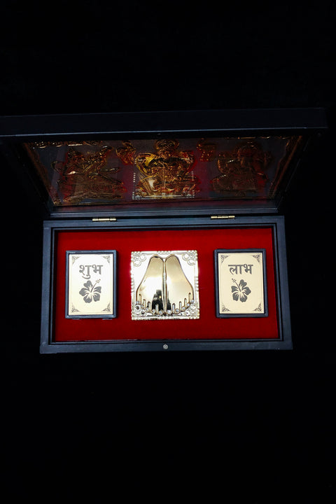 Gold Foil Laxmi Ganpati Saraswati with Charan Paduka with Acrylic Box Pack Of 1 Color Brown Devotional Prayer Box Footprint