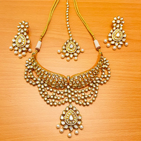 Designer Gold Plated Royal Kundan & Ruby Color Necklace with Earrings
