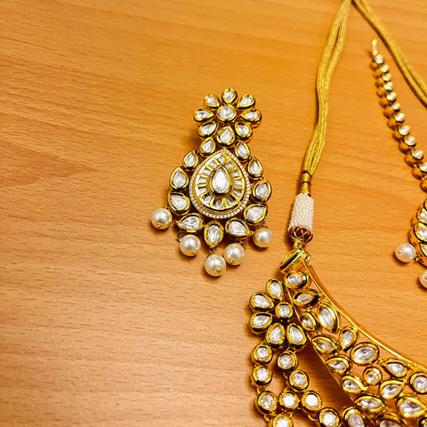 Designer Gold Plated Royal Kundan & Ruby Color Necklace with Earrings