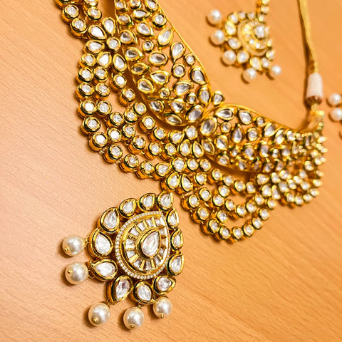 Designer Gold Plated Royal Kundan & Ruby Color Necklace with Earrings