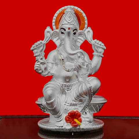 999 Pure Silver Ganesha Idol with Scarlet and Yellow Flower in Rectangular Base - PAAIE