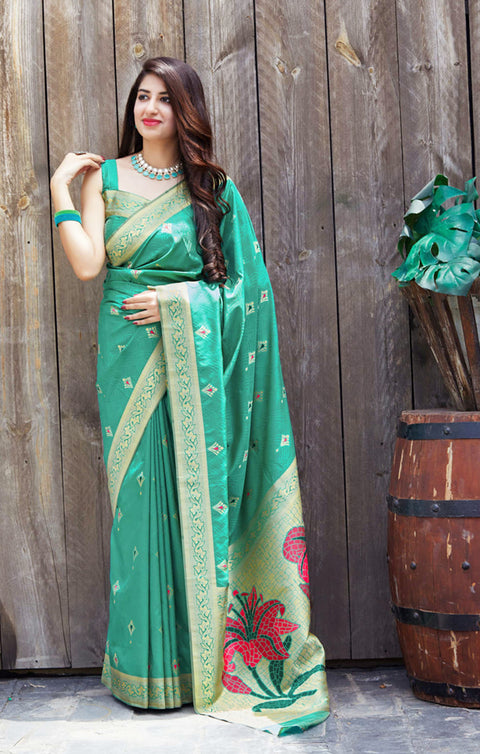 Surpassing Sea Green Color Party Wear Soft Banarasi Silk Designer Saree