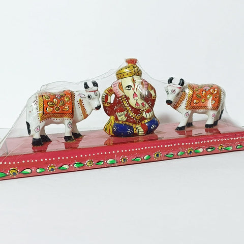 Metal Handcrafted Lord Ganesha with Standing Cow Pair on Wooden Chowki Showpiece for Home Decor (D28)